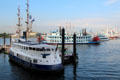 Array of day tour boats on Elbe River. Hamburg, Germany.