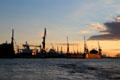 Dockyards along Elbe River seen at sunset. Hamburg, Germany.