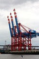 Cranes on rails at container port. Hamburg, Germany.