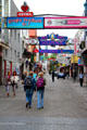 Tourists strolling Reeperbahn entertainment district. Hamburg, Germany.