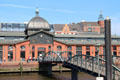 Hamburg Fish Market on Elbe River & footbridge leading to ferry pier. Hamburg, Germany