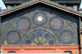 Array of stained glass windows over entrance of Hamburg Fish Market. Hamburg, Germany.