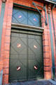 Loading doors with fish motif & winch at Hamburg Fish Market. Hamburg, Germany.