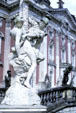 Sculpted couple embrace on lamp at Neues Palais. Potsdam, Germany.