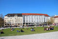 Sunbathers on Marienhof. Munich, Germany.