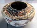Ceramic Zuni culture container with deer pierced with line of life décor from Southwest USA at Five Continents Museum. Munich, Germany.