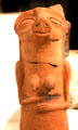 Egyptian early times ceramic statue of woman with pig's head at Neues Museum. Berlin, Germany.