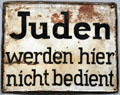 Nazi era sign saying "Jews will not be served here" at Jewish Museum Berlin. Berlin, Germany
