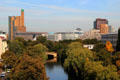 Canal with modern redevelopment around Potsdamer Platz in distance. Berlin, Germany