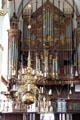 Brass chandelier & organ at St Jacob's Church. Lübeck, Germany.
