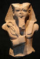 Upper half of seated King Ramses II holding crook & flail of sandstone from Nubia at Museum Ägyptischer Kunst. Munich, Germany.
