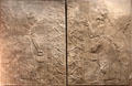 Assyrian Tree of Life being pollinated by two winged genies from Nimrud NW Palace of Kings at Museum Ägyptischer Kunst. Munich, Germany.