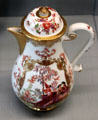 Meissen porcelain chinoiserie coffee pot with gilded surfaces at Meissen porcelain museum at Lustheim Palace. Munich, Germany.