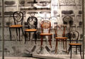 Bent cane cafe chairs with woven seats at Pinakothek der Moderne. Munich, Germany.