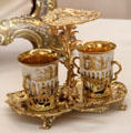 Meissen porcelain chocolate service with highly decorative gold plated tray by goldsmith Johann Jakob Adam from Augsburg at Maximilian Museum. Augsburg, Germany.