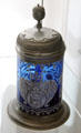 Covered blue glass krug with enameled lamb of god from Thuringia? at Coburg Castle. Coburg, Germany.