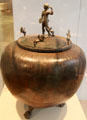 Greek bronze covered vessel with discus throwing figure used to mix wine & water from Capus at Germanisches Nationalmuseum. Nuremberg, Germany.