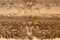 Winged creatures on Baroque sculpted hall ceiling at Fembohaus City Museum. Nuremberg, Germany.