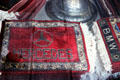 Persian carpet car mats for Mercedes & BMW in shop window. Nuremberg, Germany.