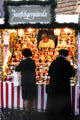 Booth of figurines made from prunes at Christmas Market on Frauen Kirche square. Nuremberg, Germany.