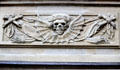 Death head detail, sometimes used as a reminder of the separation of the earth & the divine on Neumunster Collegiate Church. Würzburg, Germany.