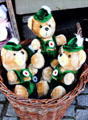Plush bears in a basket in Bavarian costume in shop window. Dinkelsbühl, Germany.