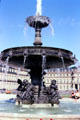 Fountain on Schlossplatz with Neues Schloss in background. Stuttgart, Germany.
