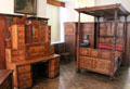 German inlaid furniture gallery with writing desk & four-poster bed at Lindau Municipal Museum. Lindau im Bodensee, Germany.
