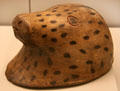 Inuit culture carved wooden helmet is shape of seal head used a lure from Arctic America at Museum of America. Madrid, Spain.