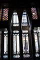 Parabolic arches of windows in rear hall at Palau Güell. Barcelona, Spain.