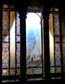 Stained glass window in rear hall at Palau Güell. Barcelona, Spain.