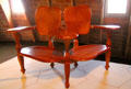 Modernista double chair replica from Casa Batlló in Barcelona by Antoni Gaudí at Casa Milà. Barcelona, Spain.