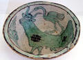 Basin with bull & long legged bird at Ceramics Museum of Barcelona. Barcelona, Spain.