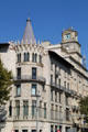 Casa Pons i Pascual with La Sud America clock tower beyond. Barcelona, Spain.