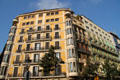 Typical corner building in Eixample district at Rambla de Catalunya & Carrer del Rosselló. Barcelona, Spain.