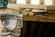 Carved animal on support beam where mansion of the Dukes of Burgundy meets town ramparts. Beaune, France