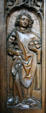 Oak choir stall carved with St Stephen in Unterlinden Museum. Colmar, France.