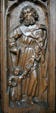 Oak choir stall carved with St Joseph or St Christopher & Christ child in Unterlinden Museum. Colmar, France.