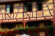 Half-timbered houses with elaborate painted patterns. Colmar, France.