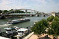 Metro train crosses Viaduc d'Austerlitz over Seine River. Paris, France.