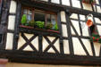 Traditional cake pan used as shop sign. Riquewihr, France.
