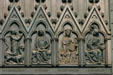 Bronze panel of central door of Cathedral showing Stes Margaret , Agnes , Catherine of Alexandria , Mary at the annunciation. Strasbourg, France.