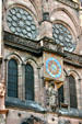 Clock & rose windows of south side of Cathedral. Strasbourg, France.