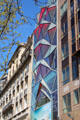 Faceted window wall of former Citroen auto showroom on Champs Elysees. Paris, France.
