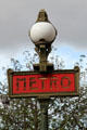 RATP metro station entrance lamp marker. Paris, France.