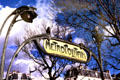 Details of Metropolitain sign & flower lights of Paris Metro entrance. Paris, France.