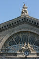 Gare de l'Est rail station with sculptures symbolizing of Strasbourg by Henri Lemaire & Rhein & Seine Rivers by Jean-Louis Brian over clock. Paris, France.