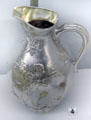 Milk pitcher by Christofle Co. of Paris at Museum of Decorative Arts. Paris, France.