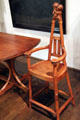 Art Nouveau child's high chair by Jean Dampt of Paris at Museum of Decorative Arts. Paris, France.