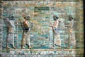 Relief mural of four archers from palace of Darius I at Suse at the Louvre Museum. Paris, France.